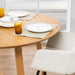 Malika Round Dining Table in Oak