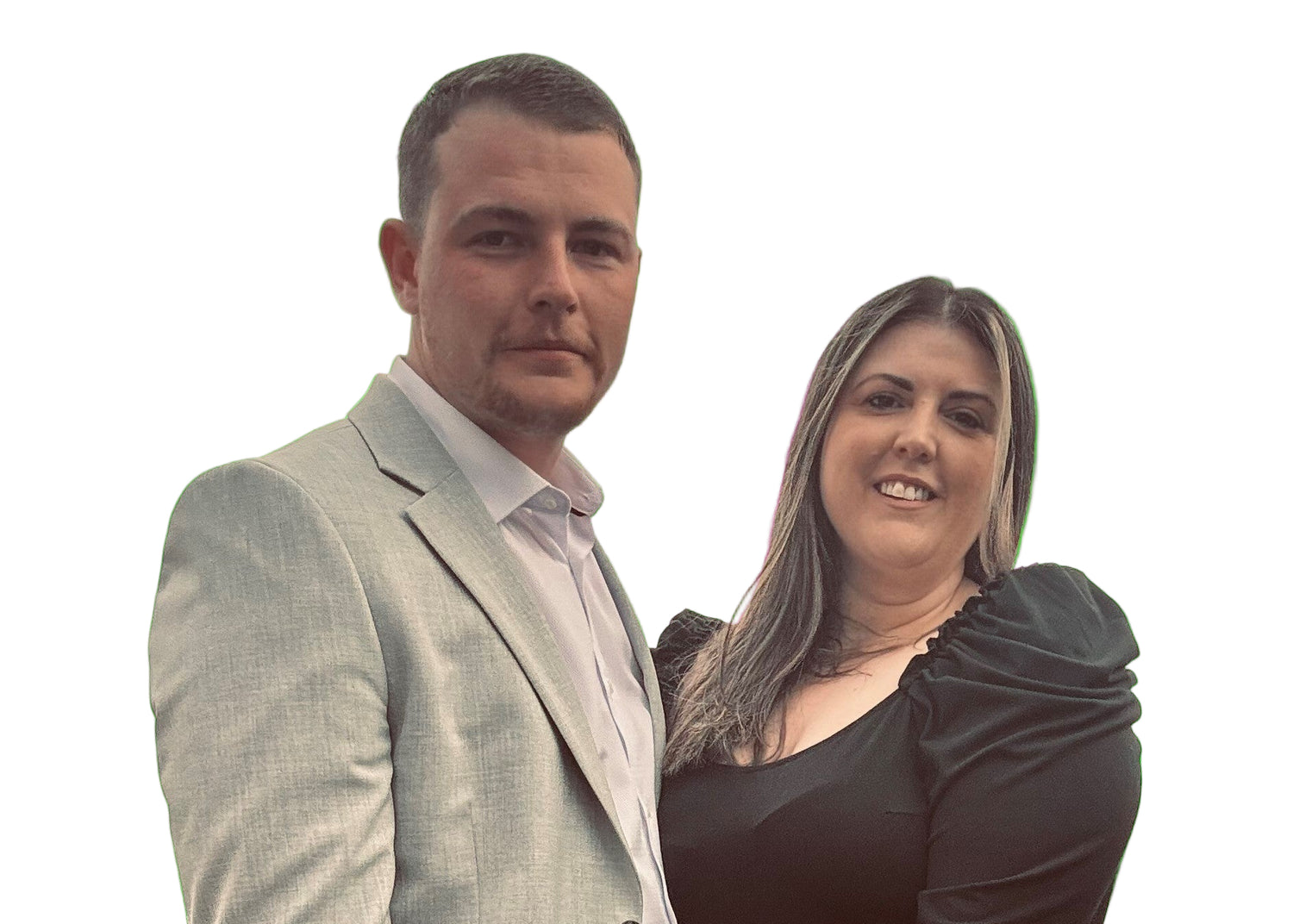 Two people standing side by side against a green screen background